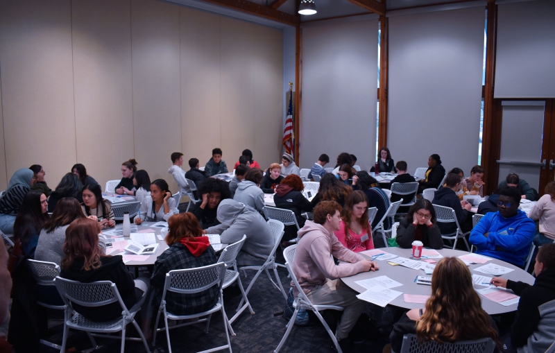 Students discuss articles from the Universal Declaration of Human Rights in the 1,000 Cups of Coffee breakout session