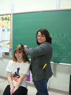 Cosmotology student works on actress's hair