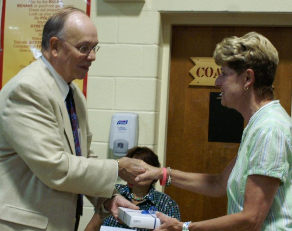 Retiree receives award from Dr. Pennoyer