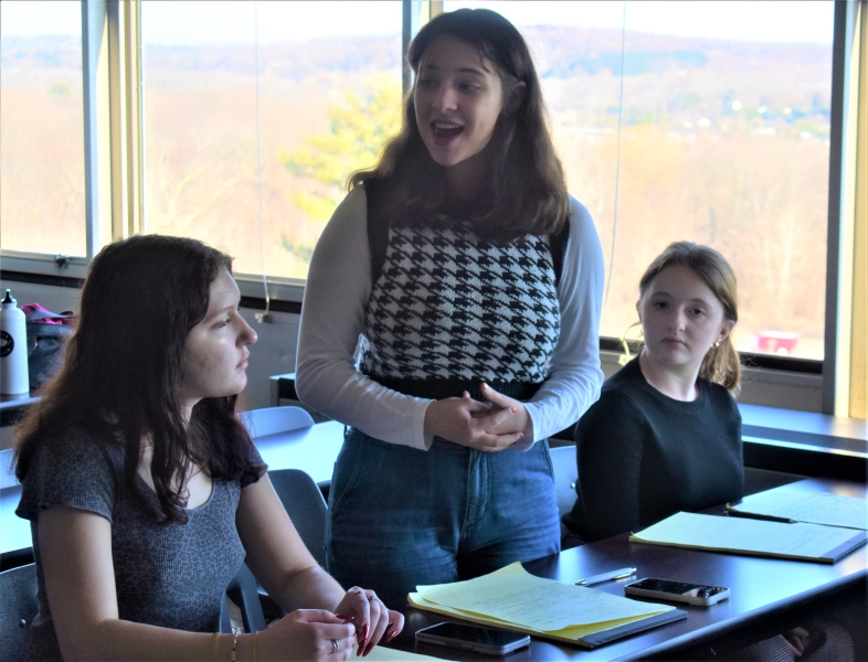 Dover students present arguments during the debate tournament.