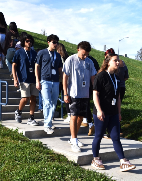 Students in Security and Law and EMT programs walk 400 steps in honor of the first responders who perished in the attacks.