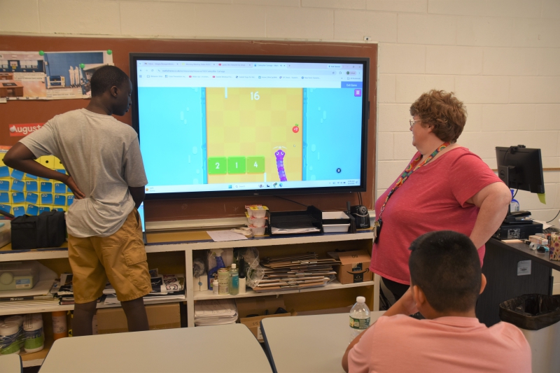 A student in Megan Flanagan's class plays "Caterpillar Carnage," a video game that helps teach math skils.