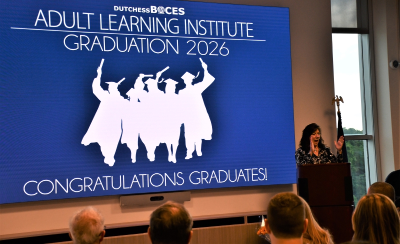 Dutchess County Executive Sue Serino applauds for the graduates.