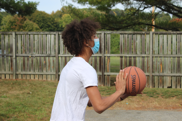 [PIC] Dutchess BOCES Alternative High School Student Wearing A Mask Prepares To Shoot A Basketball