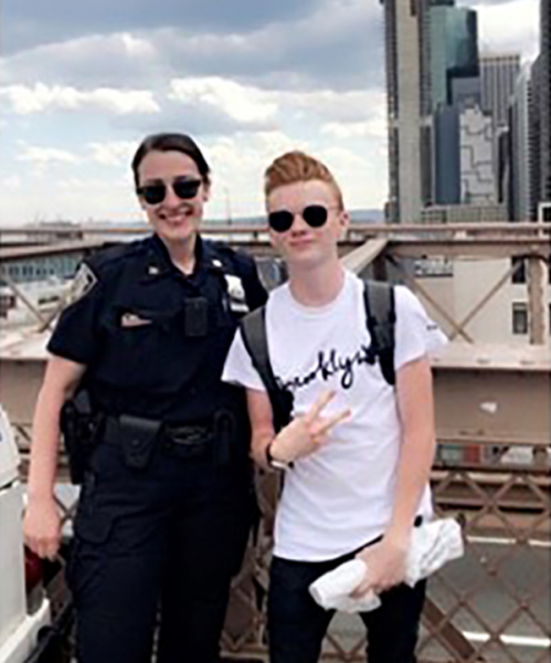 [PIC] Alternative High School Student Bobby Jackson With An Unidentifired Police Officer Fom The NYPD’s 79th Precinct