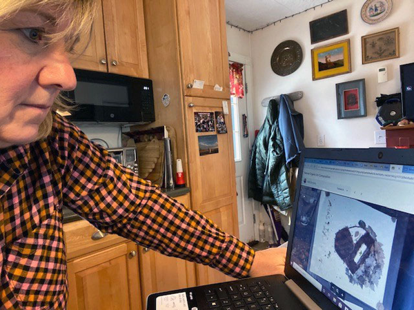 {PIC] Alternative High School Art Teacher Caroline Van Wagner Looks Over A Student Submission On Her Laptop