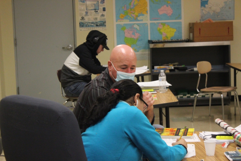 HSE instructor Richard Petschko works with a student in the HSE program.