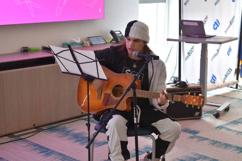 Jax Jones plays guitar and sings, "Electric Love" as part of the show.