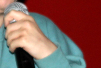 [PIC] Alternative High School Student Sings Into Microphone Thumbnail