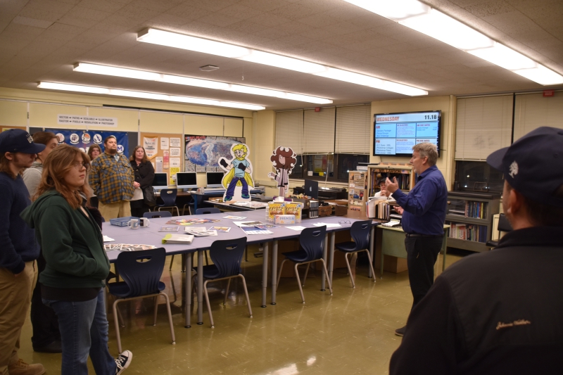 Graphic Arts and Design Teacher Steve Lawson speaks to parents during the CTI Open House.