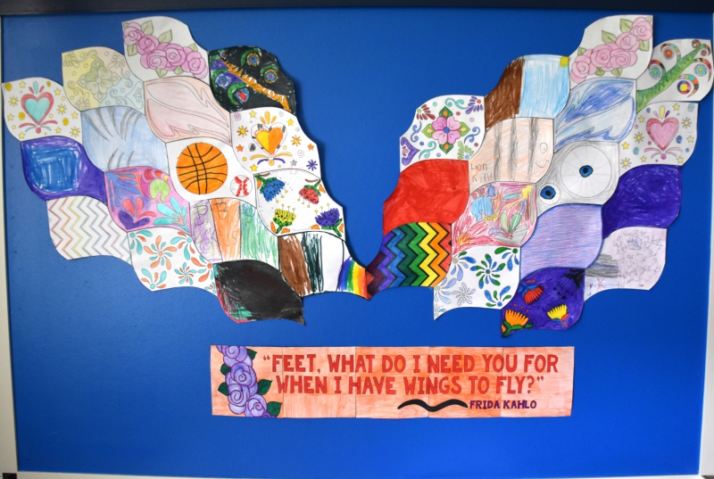 A mural made up of individually colored wings in honor of Mexican artist Frida Kahlo