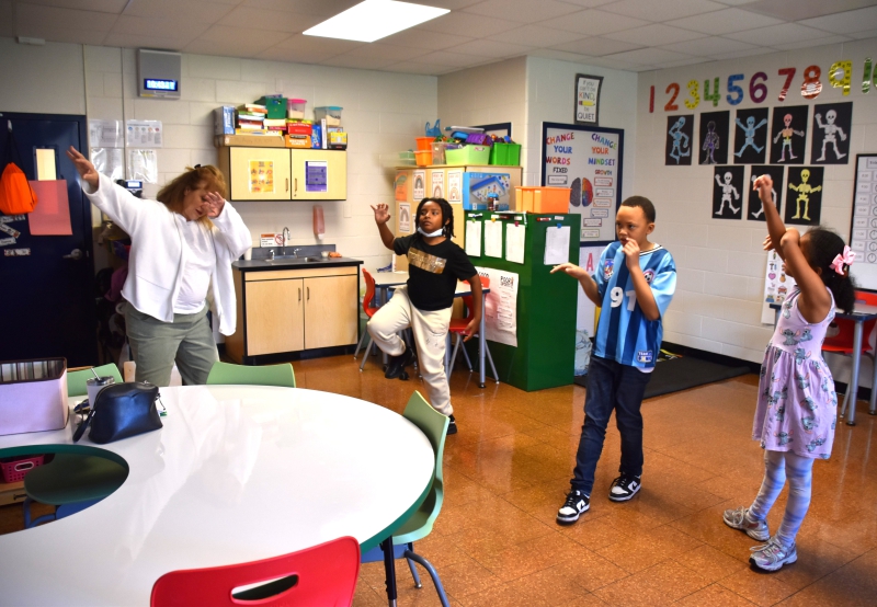 Dance Teacher Kathy Muenz teaches students at Salt Point Center the mambo as part of Hispanic Heritage month.