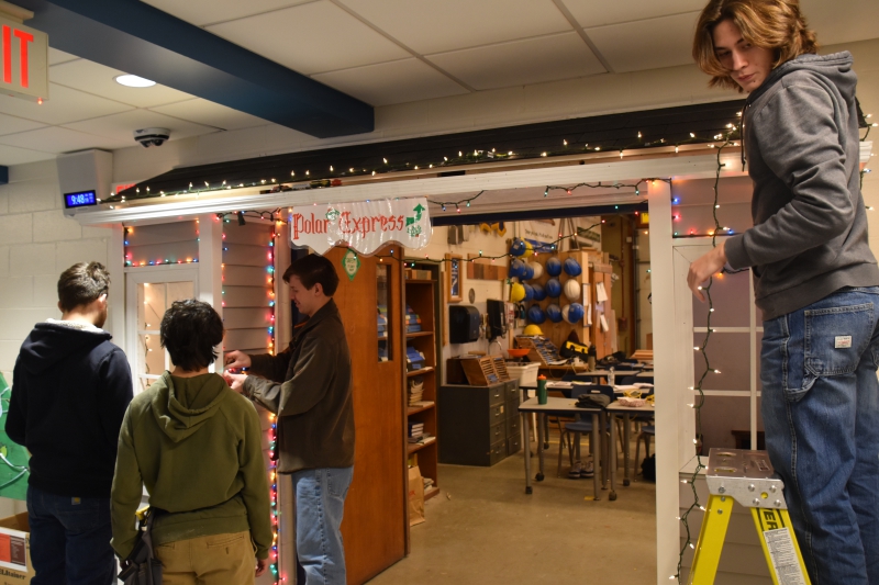Students in Tom Skean's Construction Trades program decorate their doorway as if it were the front of a home. The design took second place in the door contest.