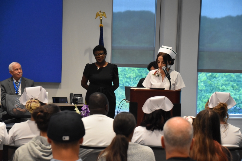 Valedictorian Haya Swaqed gives a speech during the ceremony.