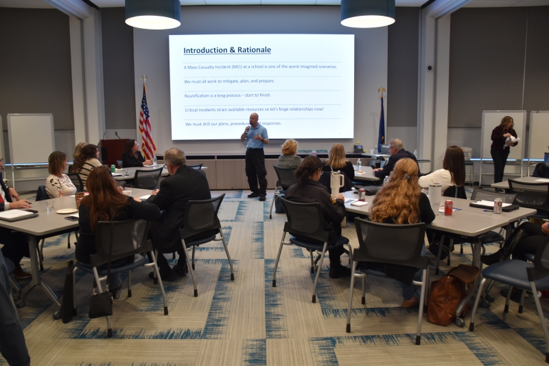 Participants in the School Safety Seminar are briefed about the tabletop scenario by Putnam-Northern Westchester BOCES Director of Regional Safety Services Frank Guglieri.