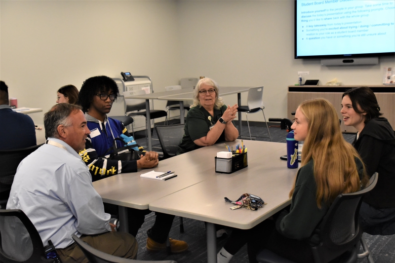 Student board members Mason McNair (BOCES), Amaia Hayes (Rhinebeck) and Lauren Barrett speak with Hyde Park Board Clerk Joanne Mikula and BOCES Director of CTE Programming and Adult Learning Nick Millas.