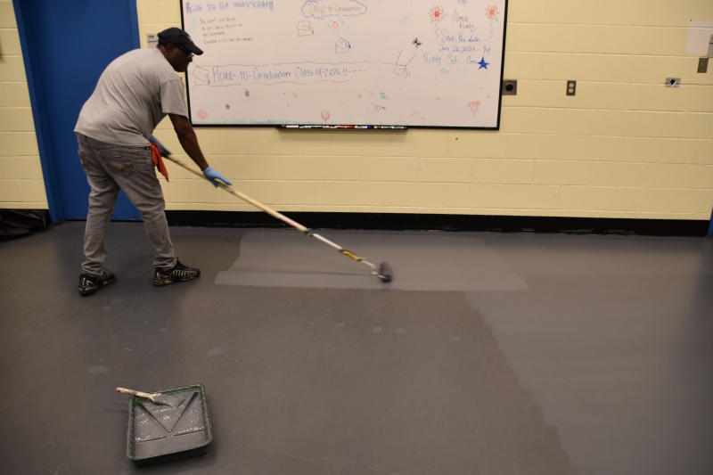 CTI's Nursing classroom floor receives a fresh coat of paint.