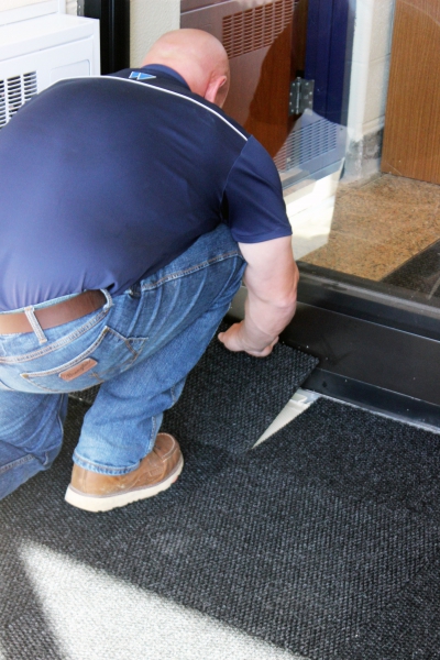 Squares of carpet are installed inside the Career and Technical Institute.