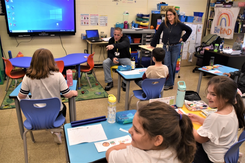 Army veteran Jaimie Browne speaks to Christine Ciccone's class in honor of Veterans Day.