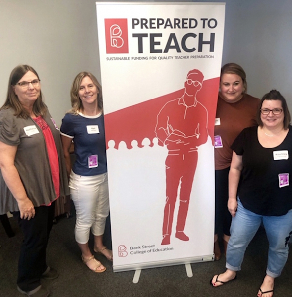 [PIC] BOCES and Marist Educators Stand with Conference Banner